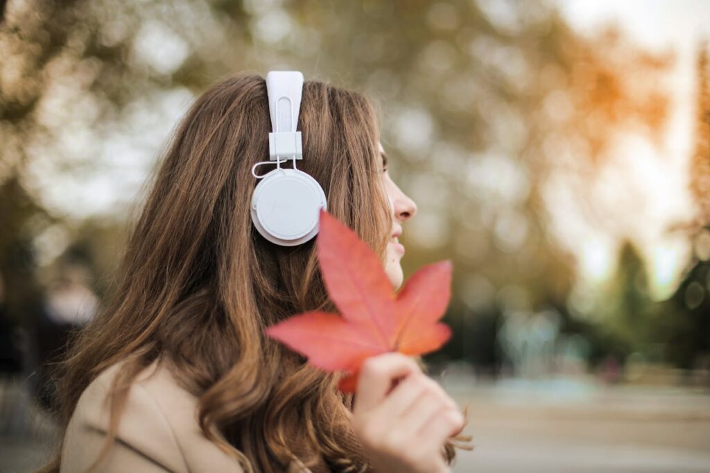 woman-wearing-white-headset LISTENING TO HEALING MUSIC