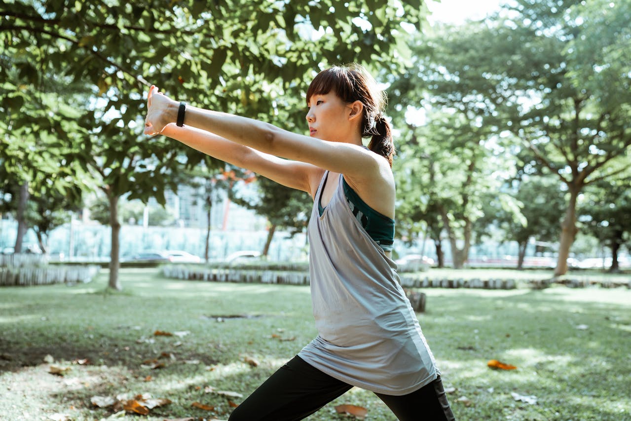 Mindful movement for mental clarity practice outdoors with stretching exercise in nature
