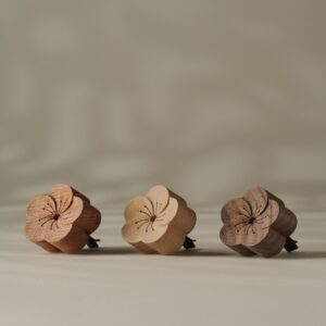 TRÄDN Plum Blossom wooden car diffuser 3-pack in assorted wood tones